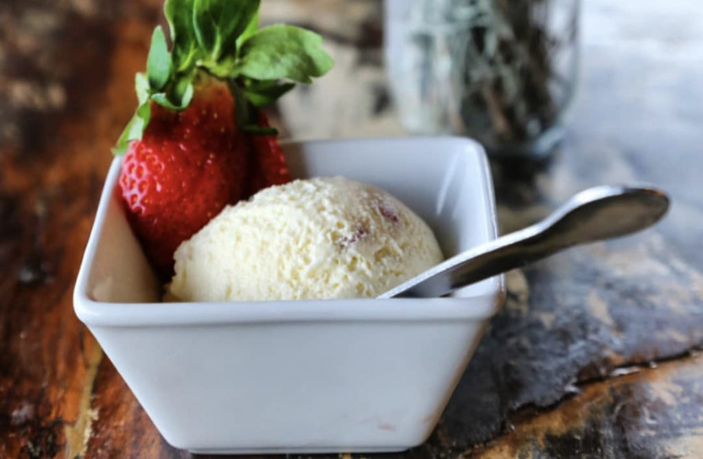 a dessert with ice cream and strawberries